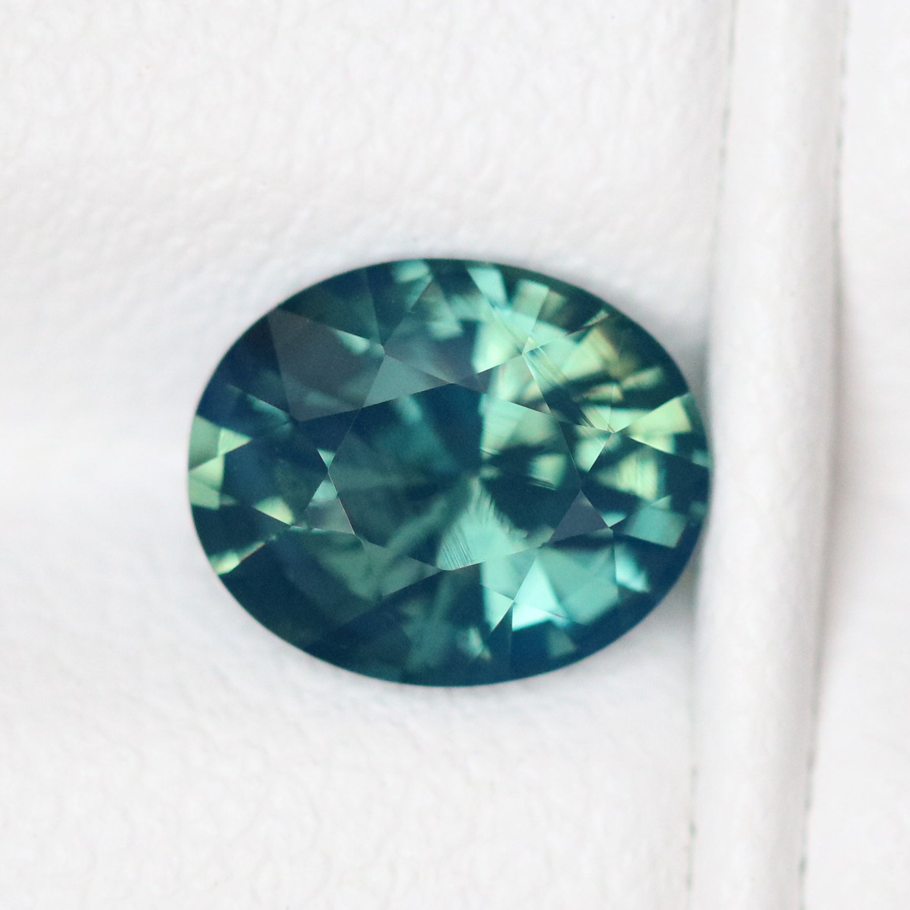 Natural Opalescent Teal Sapphire 1.73 CT